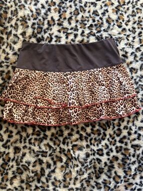 Lucky in Love Leopard Print Ruffle Mini Skirt with Brown Waistband Redish Trim.
